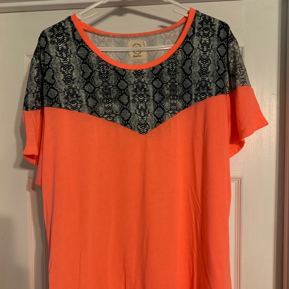 Women’s coral and snakeskin print top